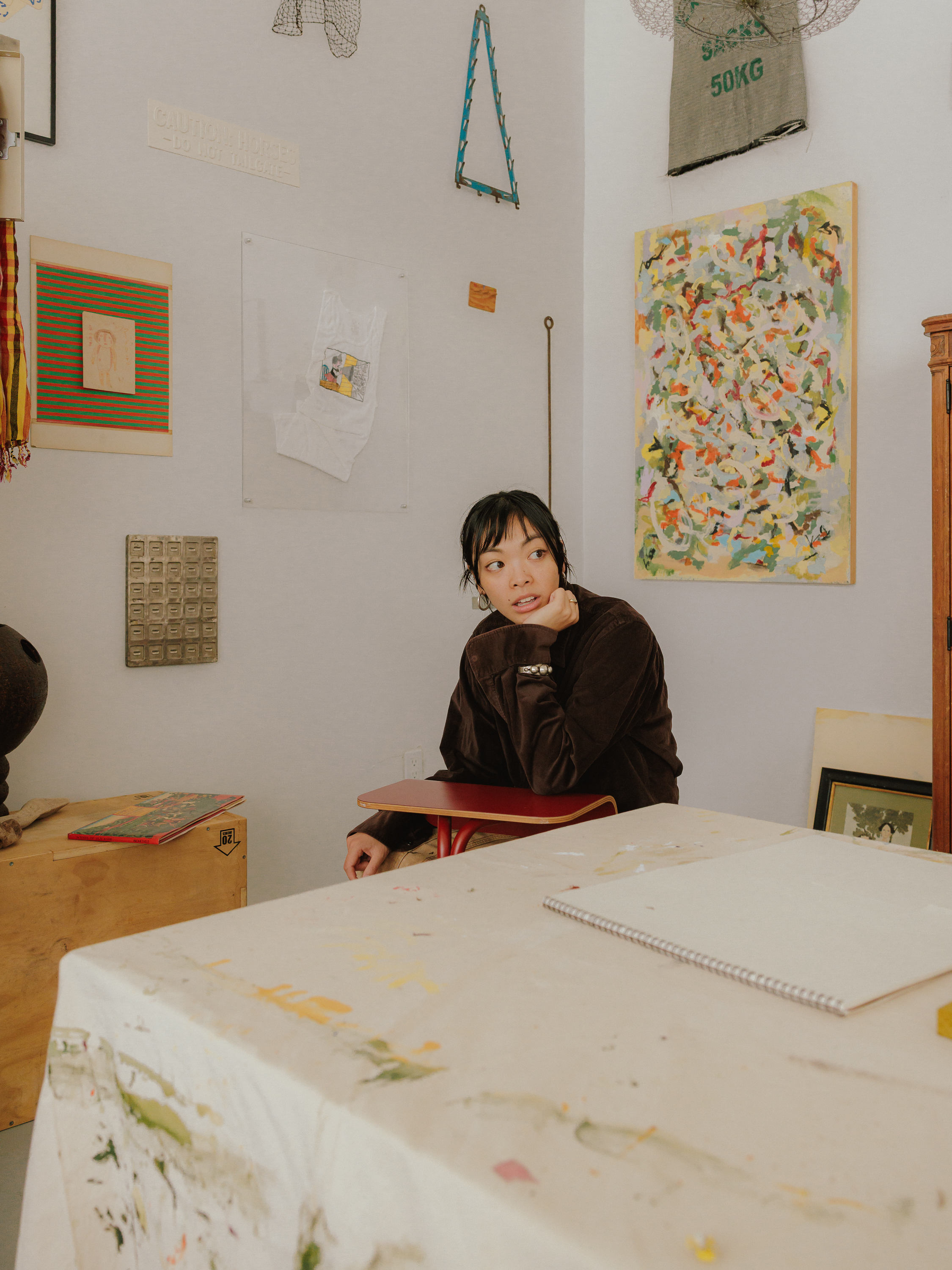 Portrait of Holly seated in the Things in a Room studio